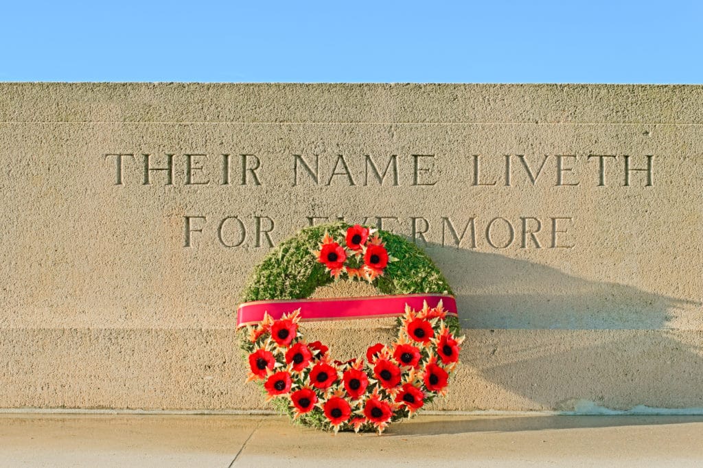 World War I monument with wreath of poppies